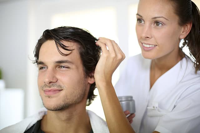 Hair treatment being applied in the clinic